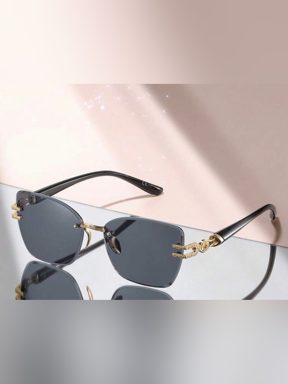Rimless Black Lens Sunglasses with Gold Accents